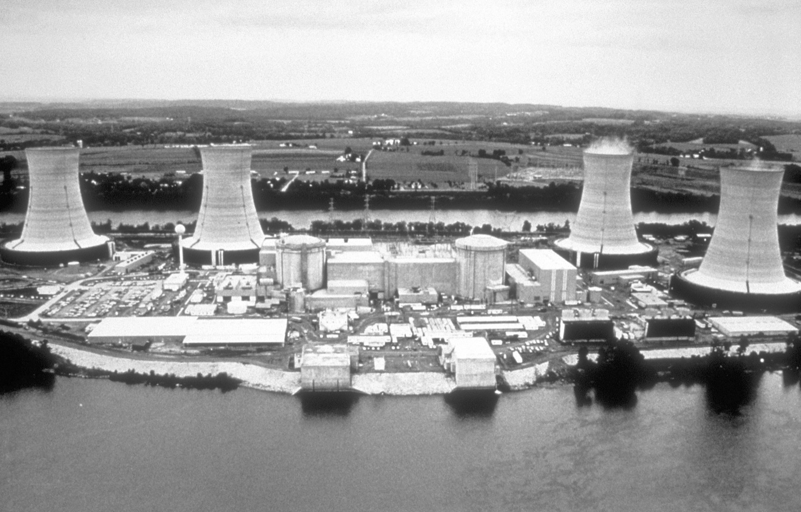Aerial view of the Three Mile Island nuclear power plant with its cooling towers on an island in the Susquehanna River